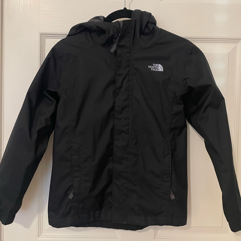 The north face black hooded raincoat, boys size small.